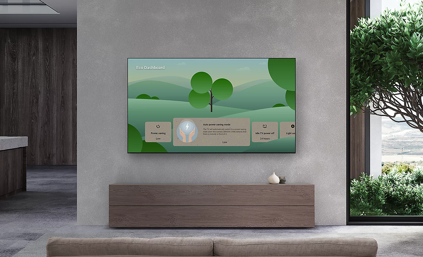 Living room with wall-mounted BRAVIA TV showing Eco Dashboard on screen